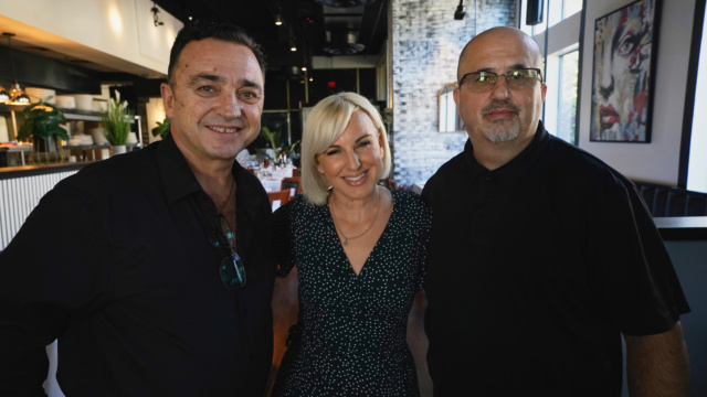 Three people posing inside SOHO during the Kickin’ It Local feature