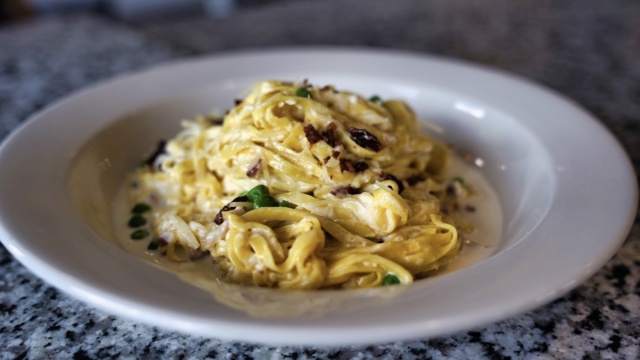 Creamy pasta with peas at DeVivo Bros. Eatery in Keller