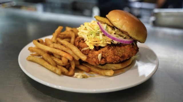 Fried chicken sandwich with slaw and fries at DeVivo Bros. Eatery in Keller