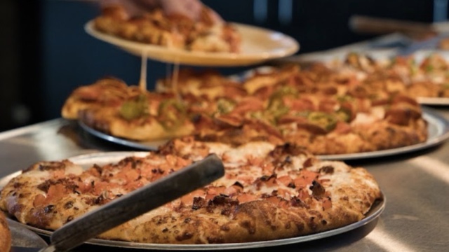 Pizzas at the serving counter at Mountain Mike’s Pizza in Keller