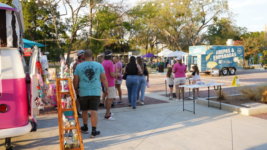 Guests explore the vendor booths along Bates Street at Depot Nights on Bates.