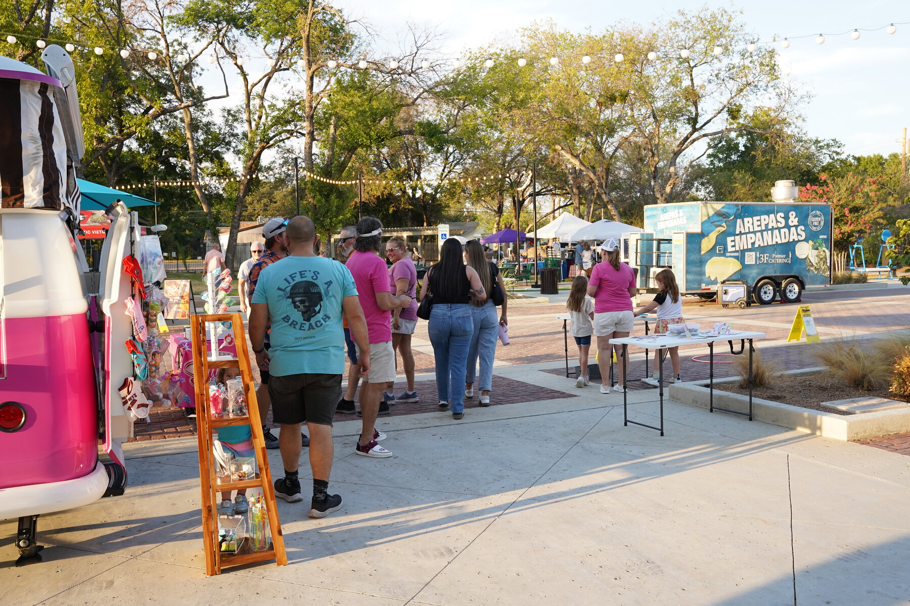 Guests explore the vendor booths along Bates Street at Depot Nights on Bates.