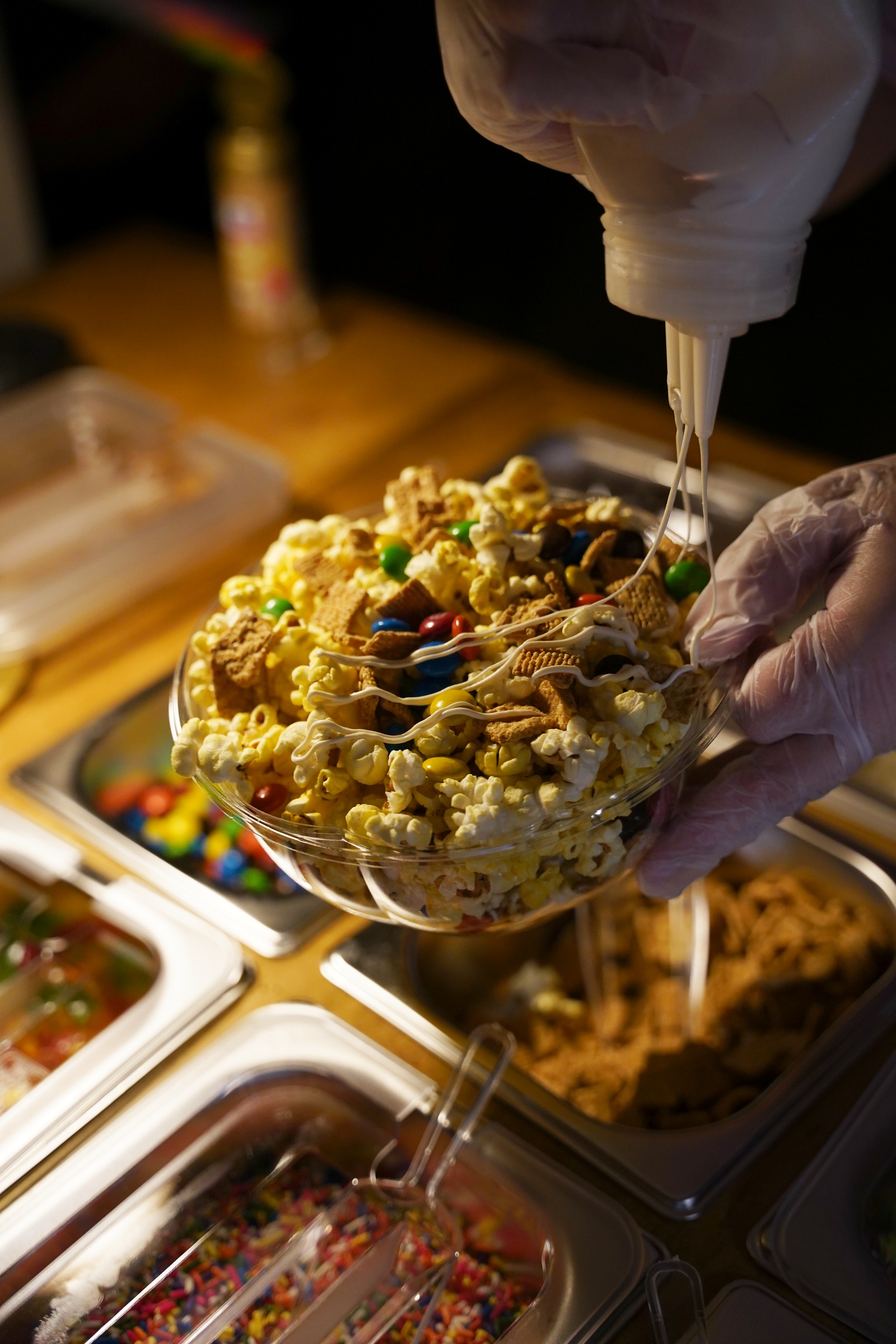 Popcorn, toppings and a finishing drizzle.